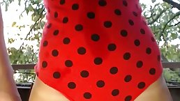 Girl in red underwear enjoys to ride her partner’s huge cock while they are outside