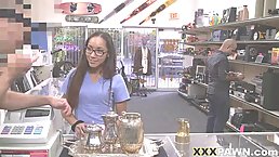 Naughty nurse is sitting on the table and touching her pussy while a guy makes a video