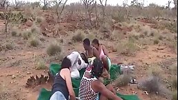 African woman is sucking dick in the nature and getting a nice facial cumshot after that