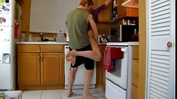 Sexy blonde woman got fucked in the kitchen, not knowing about a hidden camera there
