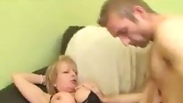 Mature blonde woman spread her legs wide open and let her young lover fuck her pussy