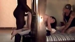 Horny black guy is fucking a white slut while her husband is watching her in action