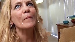 Blonde milf is smiling while sucking her husband’s big fat dick in front of the camera