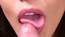 Big tited woman is drooling over a cock while waiting to get cum all over her boobs