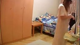 Sexy Egyptian woman is in a hotel room and changing clothes in front of a hidden camera