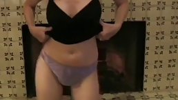 Mature blonde likes to play with her tits as well as with her young lover's dick
