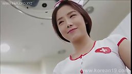 Asian nurse is about to have sex with her patient, because she likes him a lot