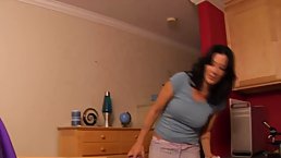 Dark haired woman is rubbing her lover's dick, because she likes to keep him satisfied