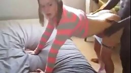 Slutty teen is sucking a big, black cock and getting fucked hard in her bed