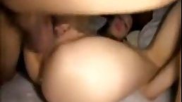 Asian guy is fucking his slutty girl, while her step brother is sleeping next to them