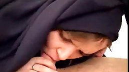 Arabic woman is sucking a rock hard dick like a whore and enjoying every second of it