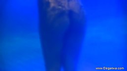 Indian milf is enjoying in her swimming pool while a hidden camera is making a video of her