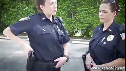Chubby police woman is sucking a skinny black guy's dick, while kneeling in front of him