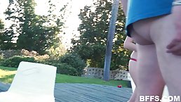 Girls are having a lot of fun in the garden with their neighbor who was watching them