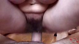 Big titted brunette with hairy pussy is getting fucked on the couch, and enjoying it a lot