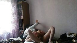 Dark haired girl is fucking a married guy in her bedroom, in front of a hidden camera