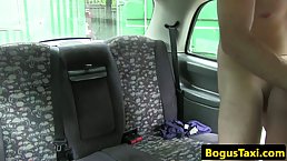 Black woman is fucking a taxi driver in the back of his car, during the day