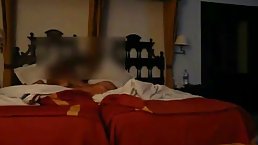 Horny couple is having wild sex in a hotel room, in front of a hidden camera