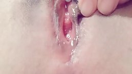 Naked Japanese babe is toying her shaved pussy in front of the camera, just for fun