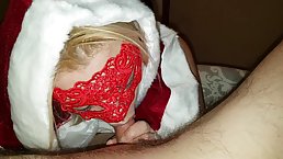 Blonde woman with a lacy mask on her face is sucking her new lover's dick