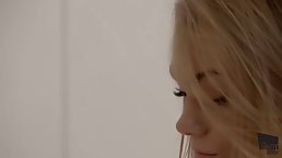 Sensual blonde girl is playing with herself in her bed, while no one else is at home