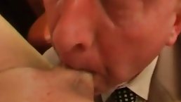 Dark haired woman is sucking her horny boss’s fat, greasy cock, in a hotel room