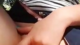 Naughty girl is masturbating in a local forest, in the middle of the day, just for fun
