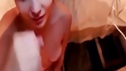 Slutty girl is kneeling and sucking dick while her partner is enjoying and moaning from pleasure