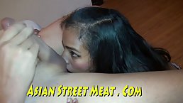 Asian slut is in the mood to suck a rock hard cock for some cash