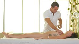 Great babe is enjoying, while her masseur is gently touching her soft slit and round ass
