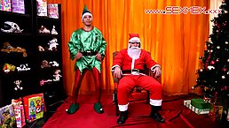 Nude brunette girl is sitting on the armchair, while her uniformed guy is making a video