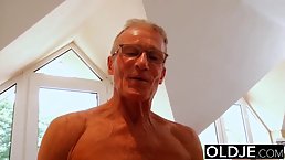 Fresh, barely legal blonde is having steamy sex with an elderly man she likes a lot