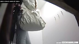 A dirty voyeur is making a video, while a hot girl is trying out her new nightie