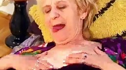 Blonde granny in shoes with high heels is rubbing her pussy to get ready for sex