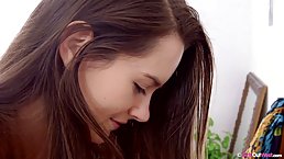 Two sexy lesbian girls are gently licking each other’s wet pussy, while on the table