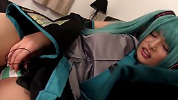 Asian babe with long green hair, Kiritani Yuria likes to masturbate in front of the camera
