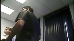 After a nice blowjob, a busty teen is taking her boss’s hard cock, while on the desk