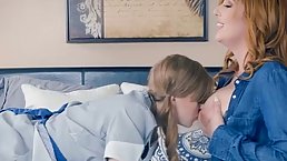Red haired woman with a beautiful smile is spreading her legs and getting her pussy licked