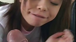 Cute Japanese babe likes to feel a rock hard dick inside her mouth, as deep as possible