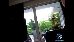 Pretty girl with big tits is sucking a huge cock and a large dildo, at the same time