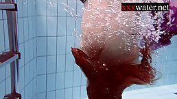 Great looking Russian bitch likes to show her amazing body, while swimming in the pool