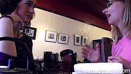 Lesbians are kissing in a coffee bar and getting ready to make love, for a bit