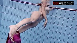 Naked Russian slut is having a nice performance for the first time, while in the pool