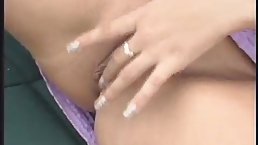 Classic milf, Cassandra is giving a nice handjob to her man, while by the pool
