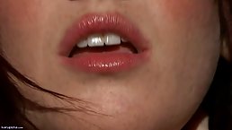 Slim, red haired chick is touching her perfectly shaved pussy before drilling it with her fingers