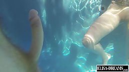 Naughty blonde chick is having sex in the swimming pool, in the middle of the day
