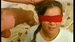 Blindfolded teen is about to suck a huge meat stick and to get fucked, until she cums