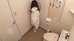 Asian nurse is masturbating in the restroom because she could not hold back from doing it