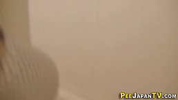 Asian teen is often teasing guys and doing stuff they like to watch on web cam