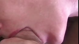 Mature blonde woman is getting fucked in a doggy style position and moaning from pleasure during sex